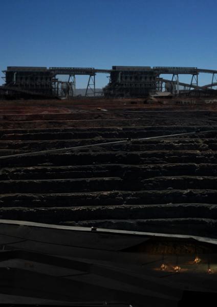 The Kalgoorlie Super Pit becomes a fine-tuned machine of artificial creation, as even the most basic excavation processes reminiscent of the old gold-mining days still devour the pit.